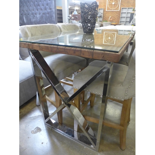 1565 - A Chennai bar table with a set of four Arlo taupe bar stools