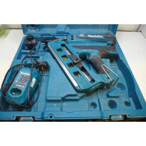 2031 - Makita GN900 cordless nail gun with 2 batteries & charger in case - W