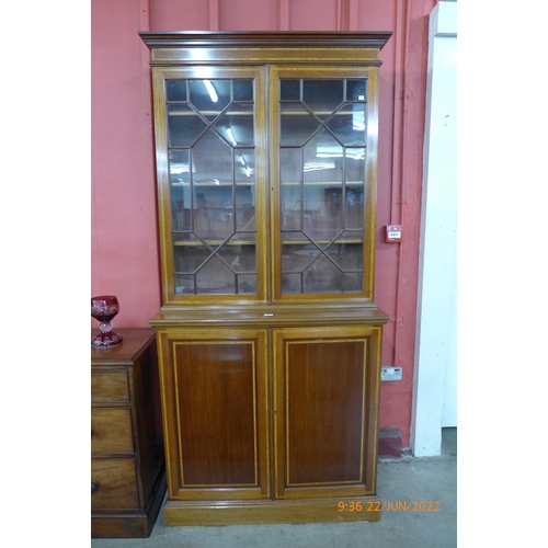 6 - An Edward VII inlaid mahogany bookcase