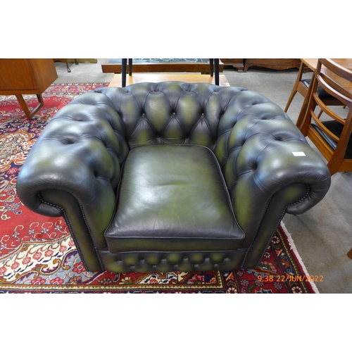 51 - A green leather Chesterfield club chair