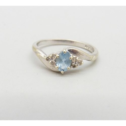 1006 - A 9ct white gold, aquamarine and diamond ring, 2.3g, O