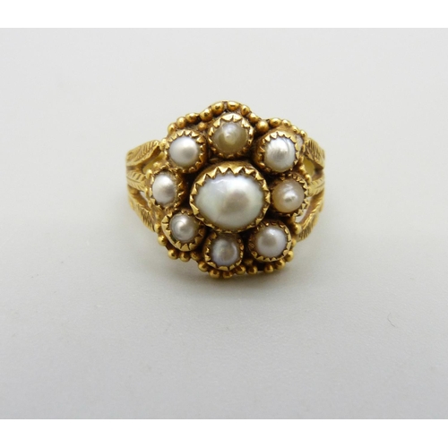 1012 - An antique yellow metal and pearl cluster ring, 5.4g, J