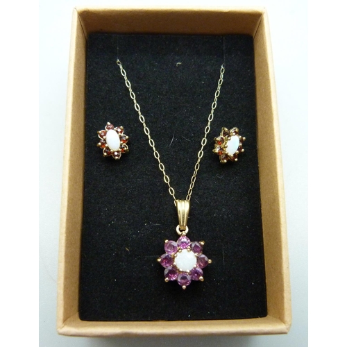 1016 - A 9ct gold, opal and garnet pendant with chain and a pair of opal and garnet earrings