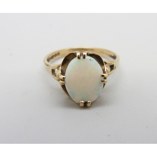 1021 - A 9ct gold and opal ring, 2.1g, N