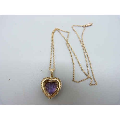 1025 - A 9ct gold, amethyst and diamond pendant and chain, 5.1g