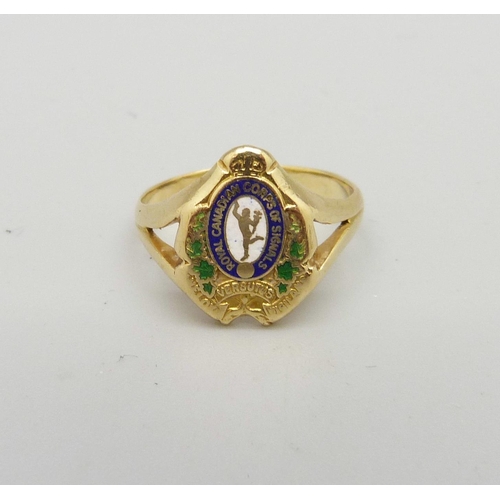 1026 - A yellow metal and enamel signet ring, 'Royal Canadian Corps of Signals', 4.4g, M, with inscription