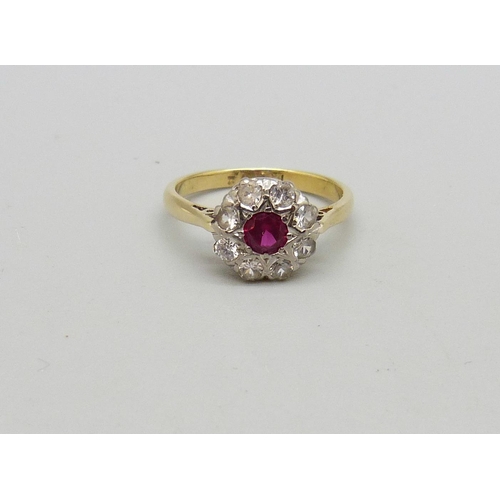 1030 - An 18ct gold, ruby and paste cluster ring, 3.2g, L