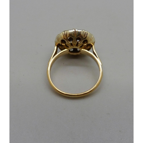 1031 - A 9ct gold, paste cluster ring, 4.2g, L