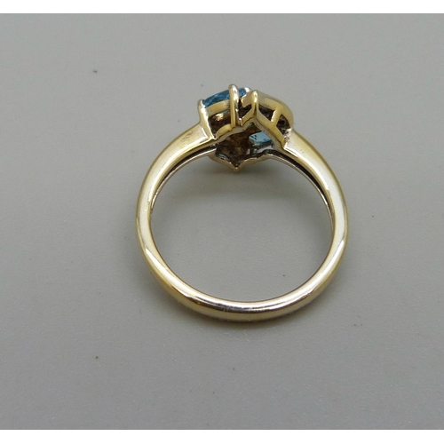 1034 - A silver gilt, apatite and zircon ring, N