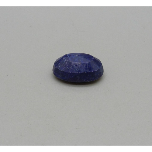 1047 - An unmounted sapphire stone, 5.7g, approximately 14mm x 20mm