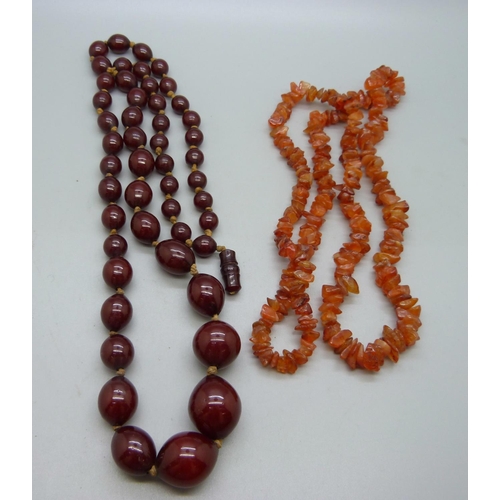 1053 - A sherry amber coloured bead necklace and an agate necklace