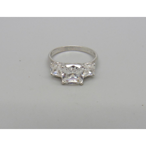 1056 - A 14ct white gold ring set with white stones, 3.5g, N