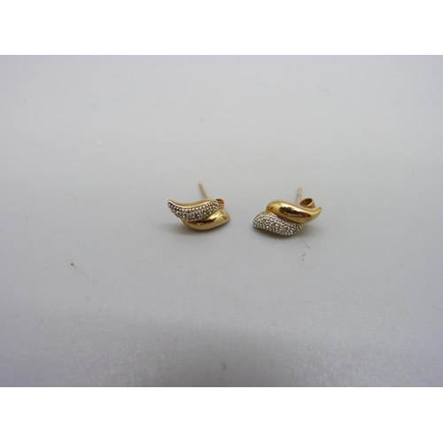 1069 - A pair of 9ct gold and diamond earrings, 2.3g