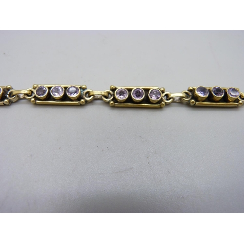 1075 - A silver gilt and amethyst bracelet, 20g