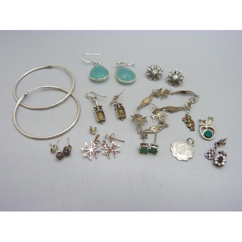 1092 - Seven pairs of silver earrings, a bracelet and six silver pendants