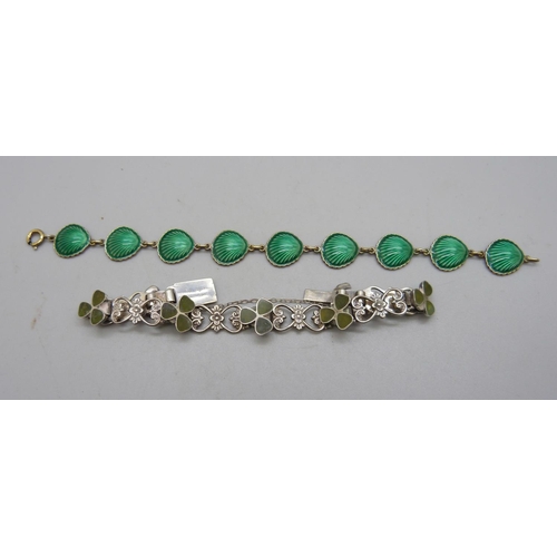 1098 - A 925 silver and green enamel shell shaped panel bracelet and a silver shamrock bracelet, shamrock b... 