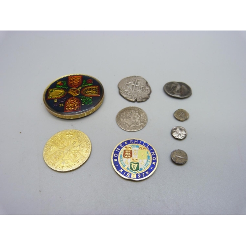 1100 - An enamelled Victorian coin, a gilt George III coin, a decorated crown and six other coins