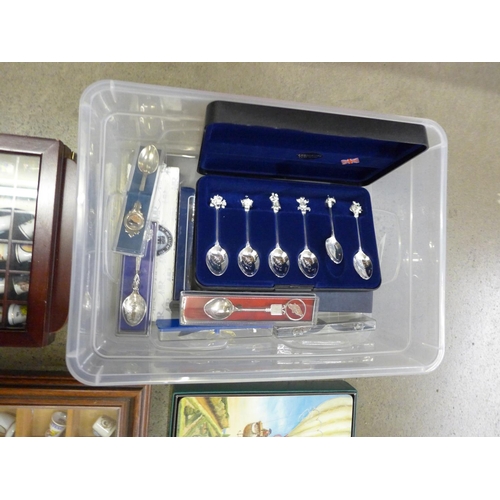 1116 - Two cases of collectors thimbles, souvenir spoons, place mats**PLEASE NOTE THIS LOT IS NOT ELIGIBLE ... 