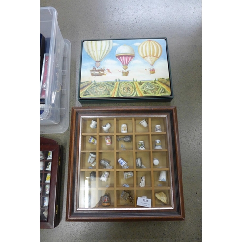 1116 - Two cases of collectors thimbles, souvenir spoons, place mats**PLEASE NOTE THIS LOT IS NOT ELIGIBLE ... 