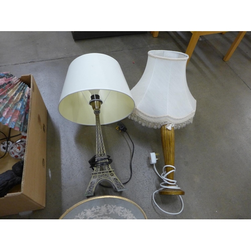 1125 - Three table lamps including one modelled as the Eiffel Tower, a cast iron cat door stop, Chinse figu... 