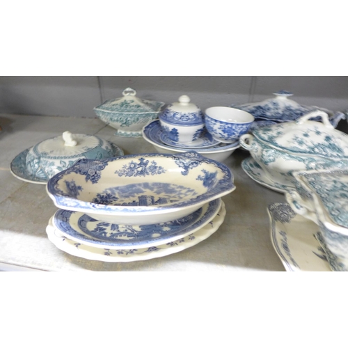 1130 - Six Staffordshire vegetable dishes and covers, one with ladle, and a collection of blue and white ch... 