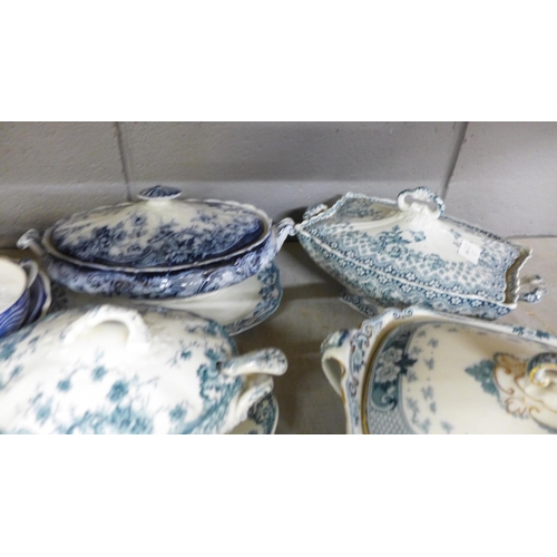 1130 - Six Staffordshire vegetable dishes and covers, one with ladle, and a collection of blue and white ch... 