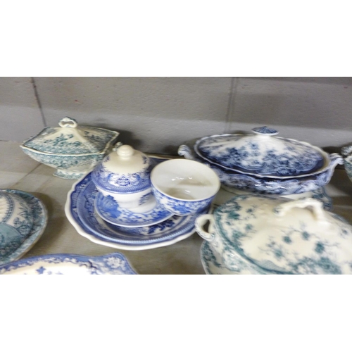 1130 - Six Staffordshire vegetable dishes and covers, one with ladle, and a collection of blue and white ch... 