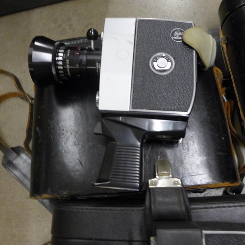 1131 - Three Bolex cine cameras, Russian Tento 20x60 binoculars and two other cine cameras**PLEASE NOTE THI... 