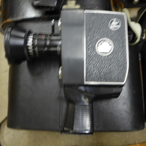 1131 - Three Bolex cine cameras, Russian Tento 20x60 binoculars and two other cine cameras**PLEASE NOTE THI... 