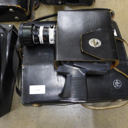 1131 - Three Bolex cine cameras, Russian Tento 20x60 binoculars and two other cine cameras**PLEASE NOTE THI... 