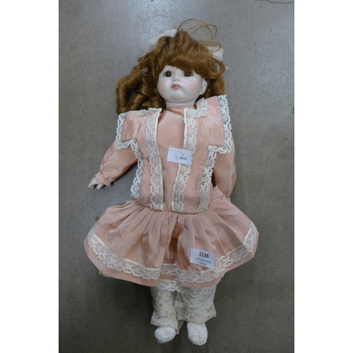 1138 - A porcelain doll**PLEASE NOTE THIS LOT IS NOT ELIGIBLE FOR POSTING AND PACKING**