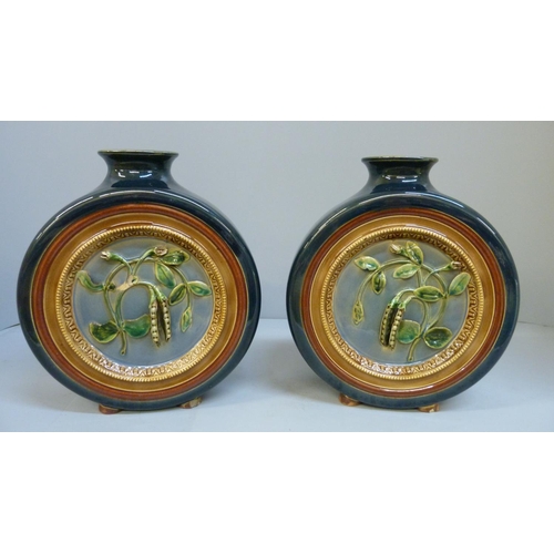 603 - A pair of Belgian circular vases decorated with peas, 20.5cm