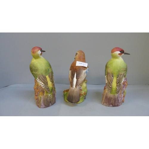 607 - Three Royal Worcester figures, two Woodpecker 3249 and Jay 3248