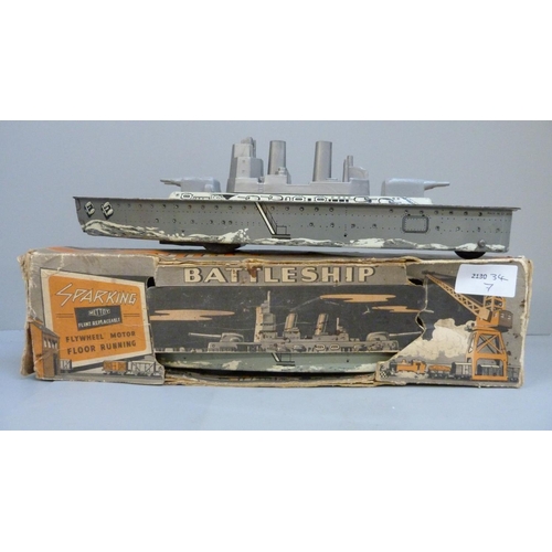 629 - Two Mettoy sparking tin plate battleships, one boxed