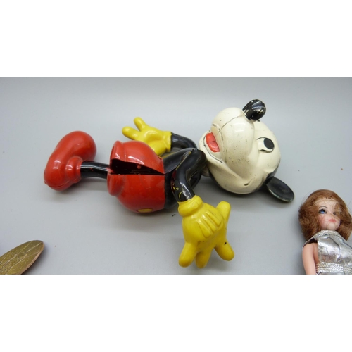 651 - A quantity of dolls including Mickey Mouse and Fumsup