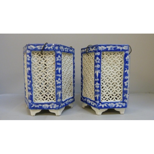 659 - A pair of Chinese porcelain pierced hanging lanterns, 18cm