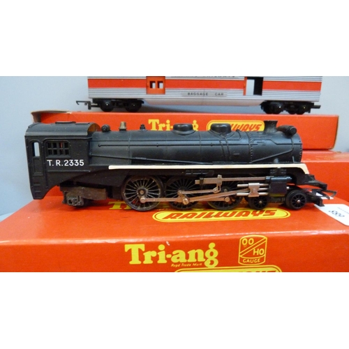 688 - A Tri-ang R54 4-6-2 Pacific loco, one other loco, carriages, etc., boxed