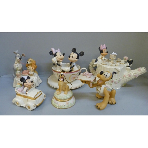 689 - A collection of Disney ceramic figures and a Mickey and Minnie Mouse teapot, Mickey and Pluto a/f