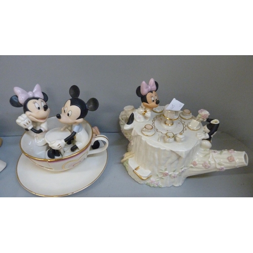 689 - A collection of Disney ceramic figures and a Mickey and Minnie Mouse teapot, Mickey and Pluto a/f