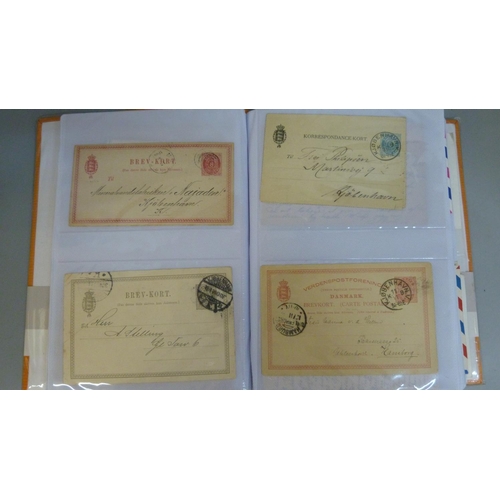 694 - Stamps; Worldwide postal stationery in album (135 items)