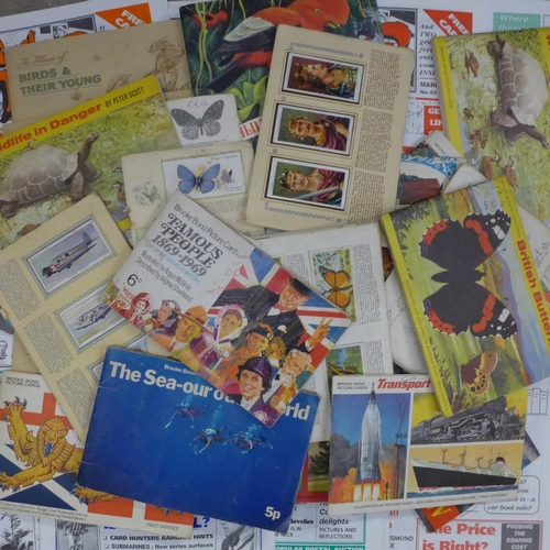 732 - Cigarette cards; a large box of cigarette and trade cards, loose and in albums