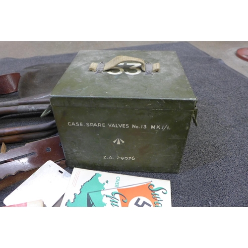 748 - A box of military items; helmet, flask, bugle, paperwork, etc.