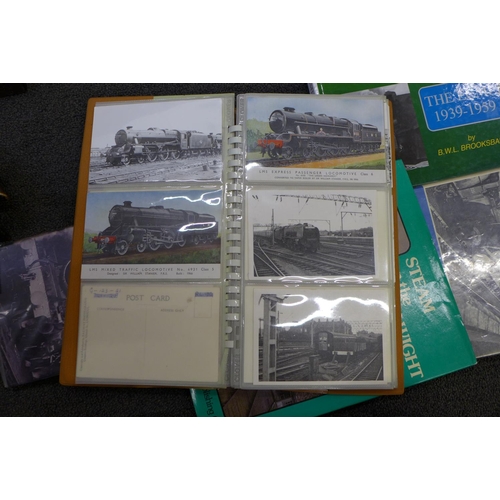 750 - A box of railway books, a locomotive door stop and four model locomotives