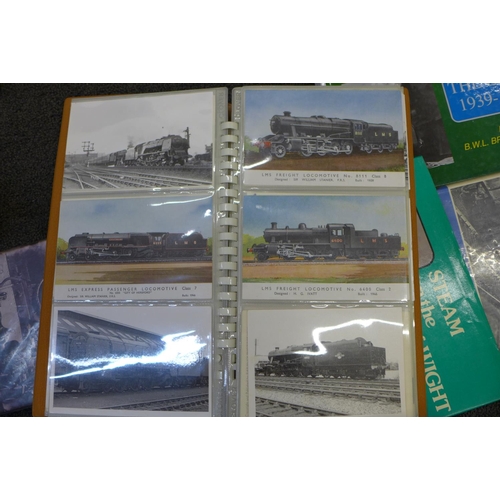 750 - A box of railway books, a locomotive door stop and four model locomotives