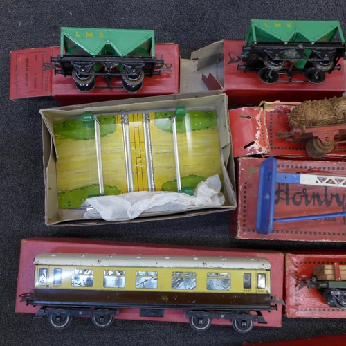 753 - An assortment of boxed Hornby 0 gauge rolling stock, signals, etc.