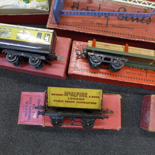 753 - An assortment of boxed Hornby 0 gauge rolling stock, signals, etc.