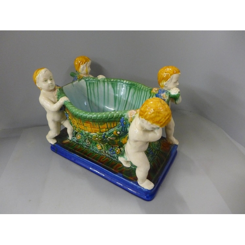 798 - A Majolica pottery Cherub centerpiece