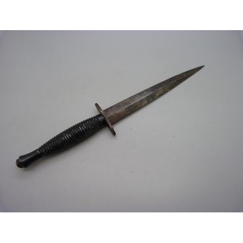 836 - A commando knife, marked on the guard J. Nowill & Sons, Sheffield, England