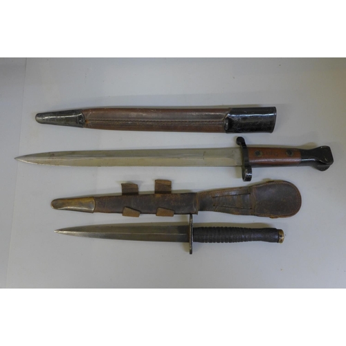 837 - A WWI bayonet and a Commando knife, both with scabbards