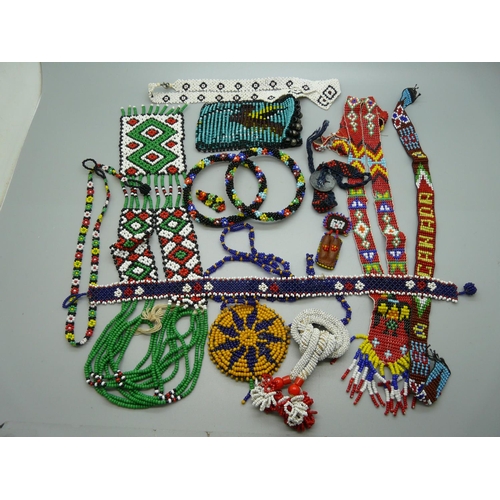 904 - A collection of native beadwork jewellery and adornments, one band marked Canada